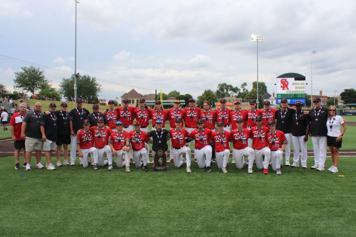 The Triad Baseball team poses with their Class 3A State Runner-Up trophy after all was said and done at Slammers Stadium on Saturday, June 13. From left to right, back row: Asst. Principal Josh Ackerman, Athletic Director Kenny Deatherage, Trainer Jack Edgar, Trainer Lukas Brase, Coach Sam Weber, Coach Josh Hunt, Matt Morris, Keegan Seipp, Pearce Goodfield, Auggie Bugger, Brody Hasquin, Nolan Keller, Kade Rocca, Nolan Miller, Wyatt Niedbalski, Evan Brown, Lane Summers, Asst. Coach Joe Wade, Asst. Coach Katom Parnell, Head Coach Jesse Bugger, Principal Kelli Barbour. Front row: Kody Anderson, Kannon Seipp, Maddox Hunt, Braxton Yates, Landon Wongler, Carter Gaskill, Grayson Yank, Brock Becker, Grady Miller, Nathan Klucker, Cohen Horst. (Ray Popkess photo) 